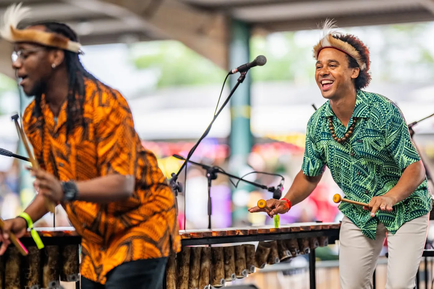 Two members of Otto and the Mutapa Calling playing marimba outdoors at Celebraaition