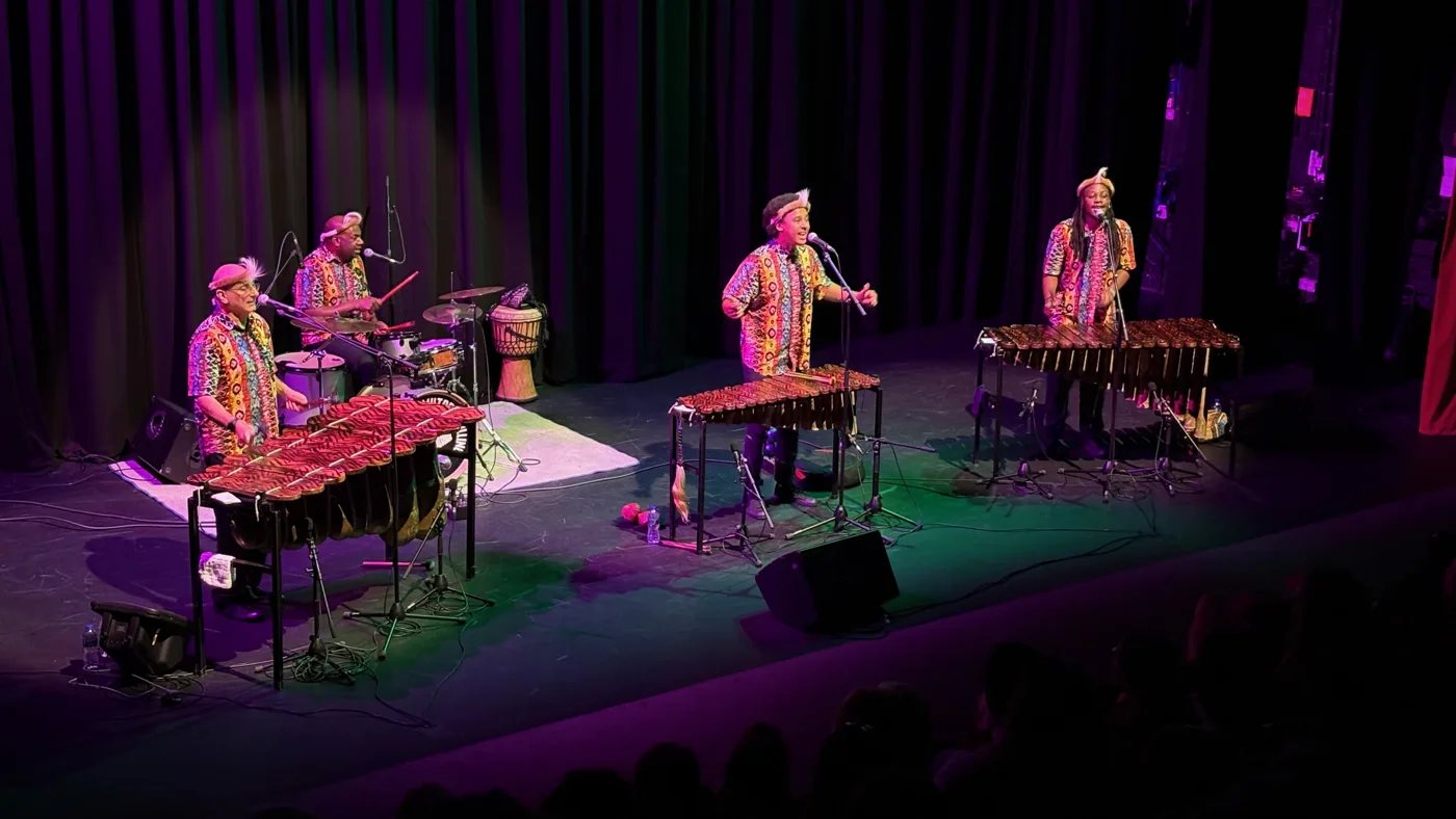 Otto and the Mutapa Calling performing on a theatre stage at Jersey Arts Centre