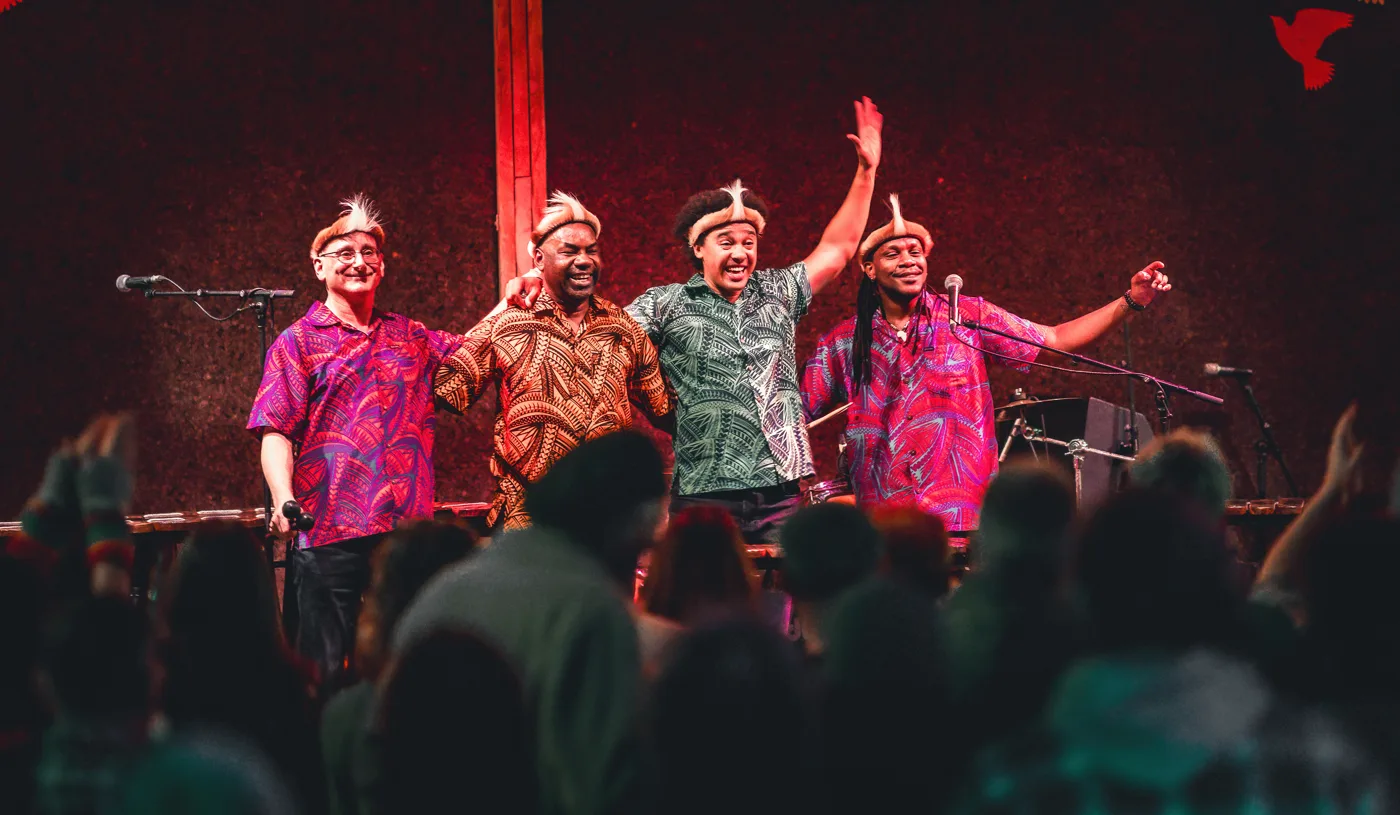 Otto and the Mutapa Calling take a bow in front of an audience