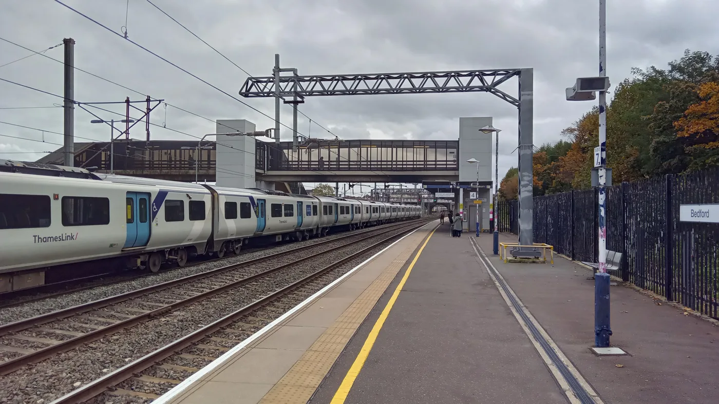 A Thameslink service at Bedford. Two operators share the station: East Midlands Railway runs the fast trains, Thameslink runs the frequent ones